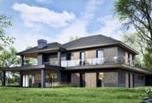 Nowoczesny dom energooszczędny z dużymi tarasami i balkonami, otoczony zielenią, idealny dla optymalnego wypoczynku i harmonii z naturą.